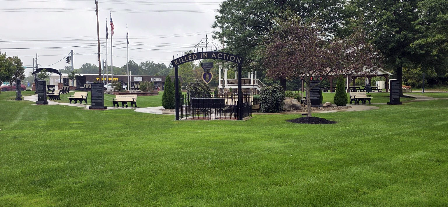 Macedonia memorial and park area with flags and landscaping